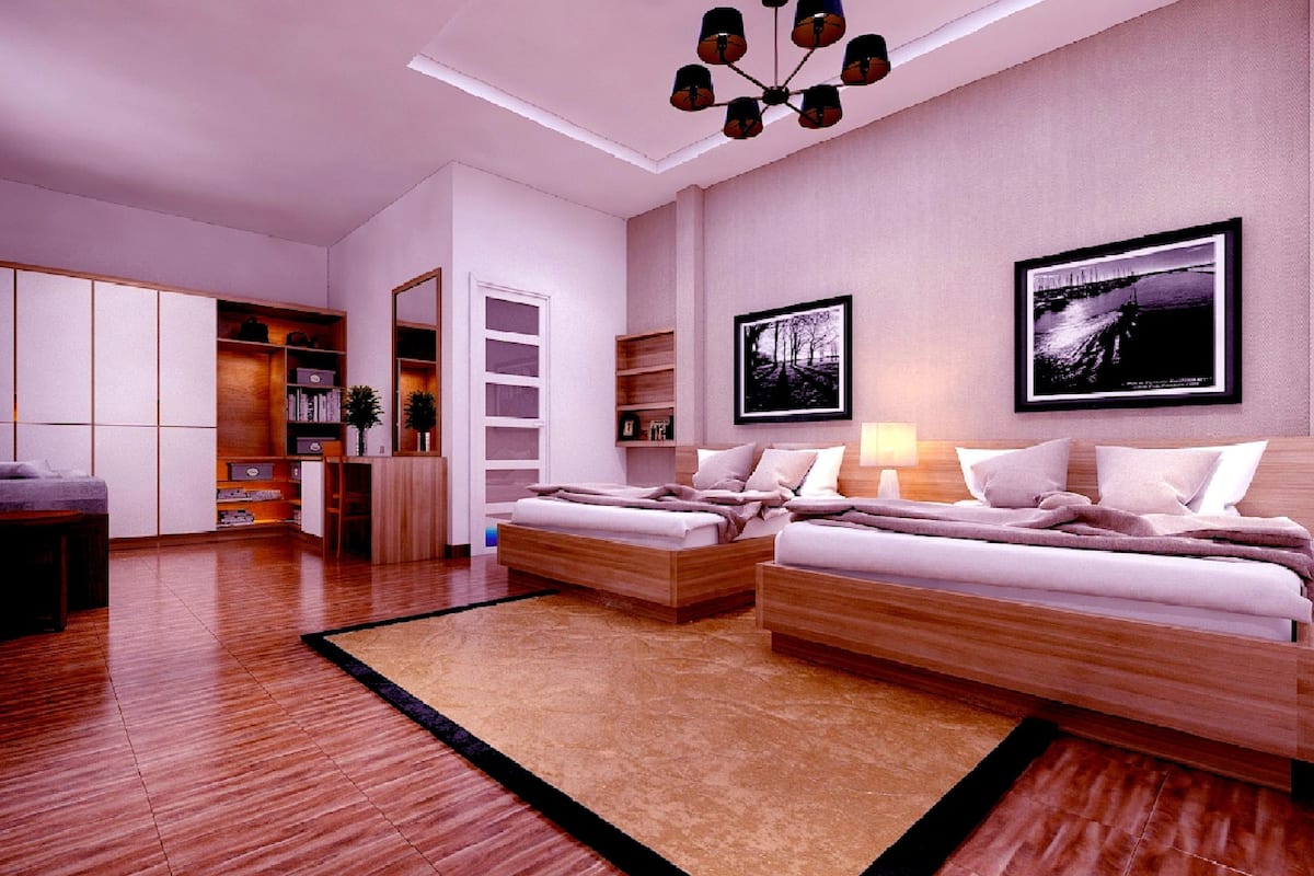 Family Suite, 2 Queen Beds, Pool View | Living room | 32-inch TV with cable channels