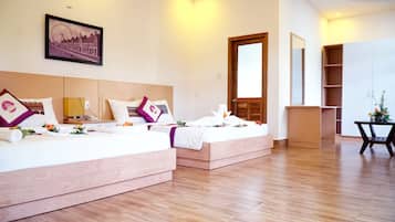 Family Suite, 2 Queen Beds, Pool View | Minibar, desk, blackout drapes, iron/ironing board