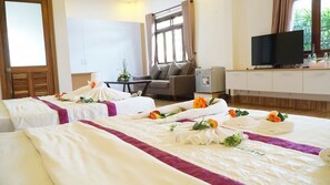 Family Suite, 2 Queen Beds, Pool View | Minibar, desk, blackout curtains, iron/ironing board - Camellia Resort & Spa (Phu Quoc)