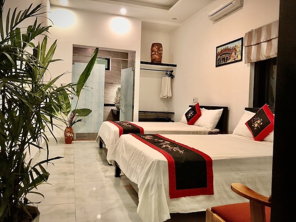 Chambre Familiale | Literie de qualité supérieure, surmatelas, minibar