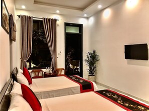 Family Room | Premium bedding, pillowtop beds, minibar, in-room safe