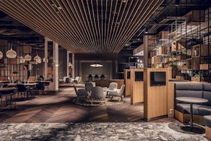 A modern interior with a central seating area, wooden shelving, and a marble floor.