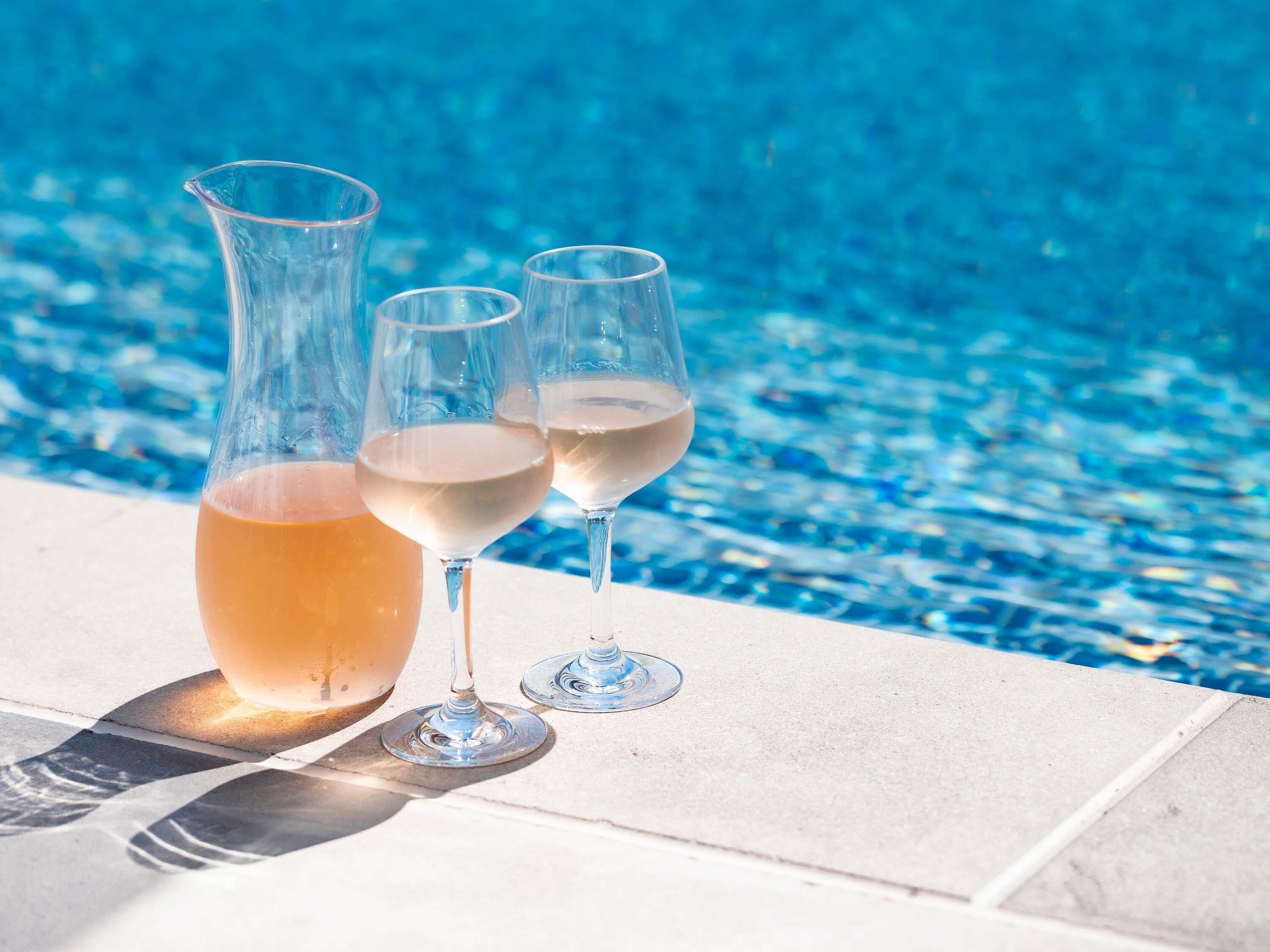 Outdoor pool, open 6 AM to 9 PM, sun loungers