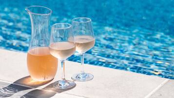 Outdoor pool, open 6 AM to 9 PM, sun loungers