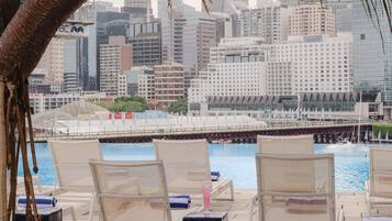 Outdoor pool, open 6 AM to 9 PM, sun loungers