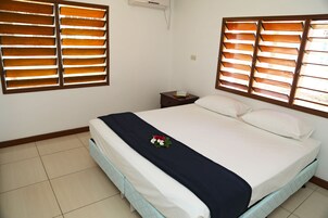 Quarto casal, banheiro privativo | Wi-Fi de cortesia, roupa de cama