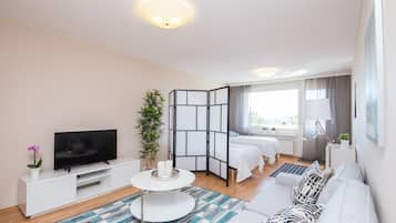 Apartamento standard, 1 quarto, vista para a cidade | Individualmente decorados, individualmente mobiliados, escrivaninha