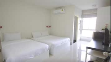 Escritorio, cortinas blackout, wifi gratis y ropa de cama