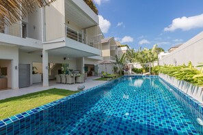 Outdoor pool, pool umbrellas, pool loungers
