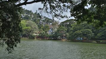 A lake with buildings in the background.