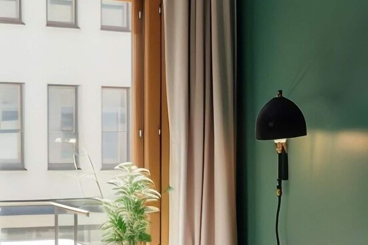 Cortinas blackout, quartos à prova de som, Wi-Fi de cortesia