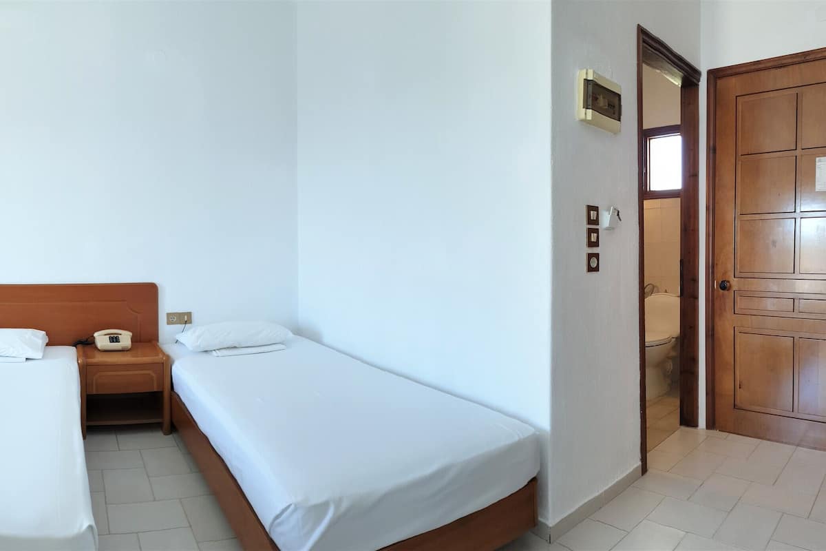 Triple Room | Bed sheets
