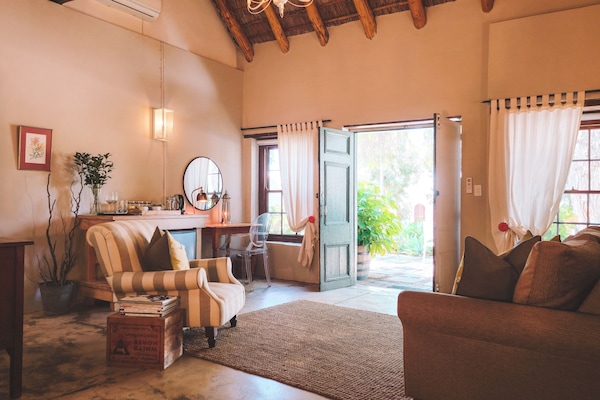 The Old Village Trader Suite | Living area | 32-inch Smart TV with digital channels, TV, Netflix
