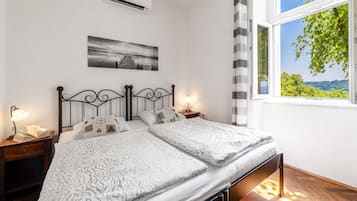Apartment, 1 Bedroom, Terrace, Sea View | 1 bedroom, iron/ironing board, free WiFi, bed sheets