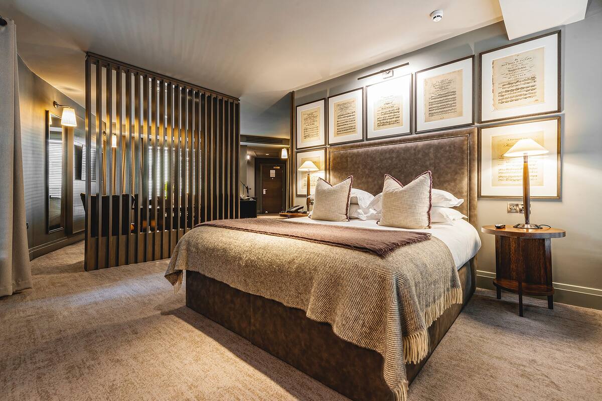 signature suite | hypo-allergenic bedding, in-room safe, individually decorated