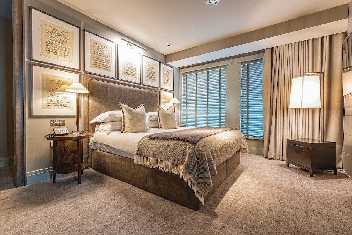 signature suite | hypo-allergenic bedding, in-room safe, individually decorated