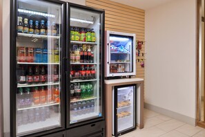 A refrigerated display case with various beverages and snacks. - Holiday Inn Express & Suites Van Horn by IHG (Van Horn)
