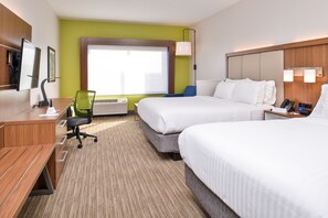 A hotel room with two beds, a desk, a chair, a TV, and a window with blinds. - Holiday Inn Express & Suites Van Horn by IHG (Van Horn)