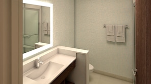 A modern bathroom with a large mirror, a sink, and a toilet. - Holiday Inn Express & Suites Van Horn by IHG (Van Horn)