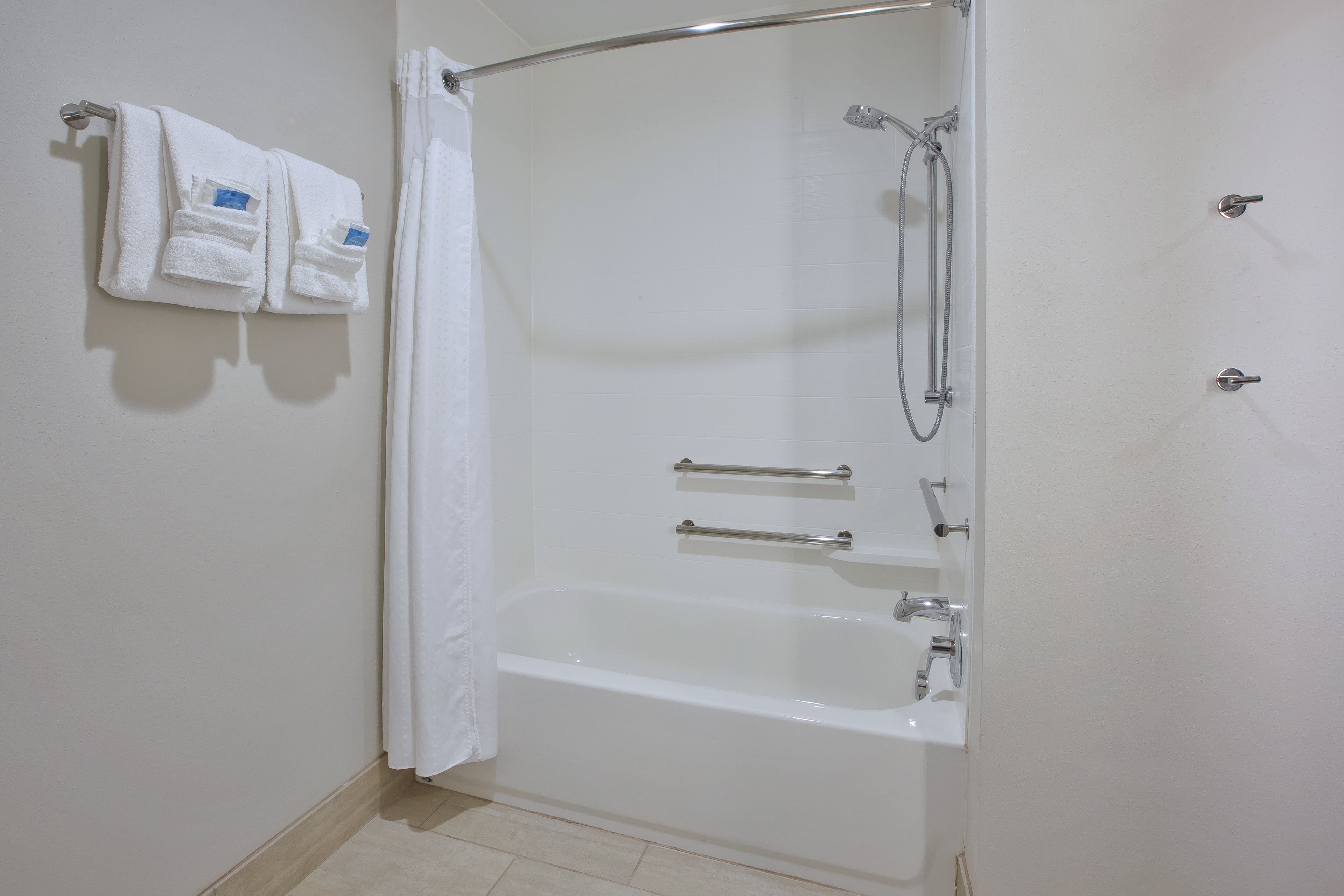 combined shower/bathtub, free toiletries, hair dryer, towels