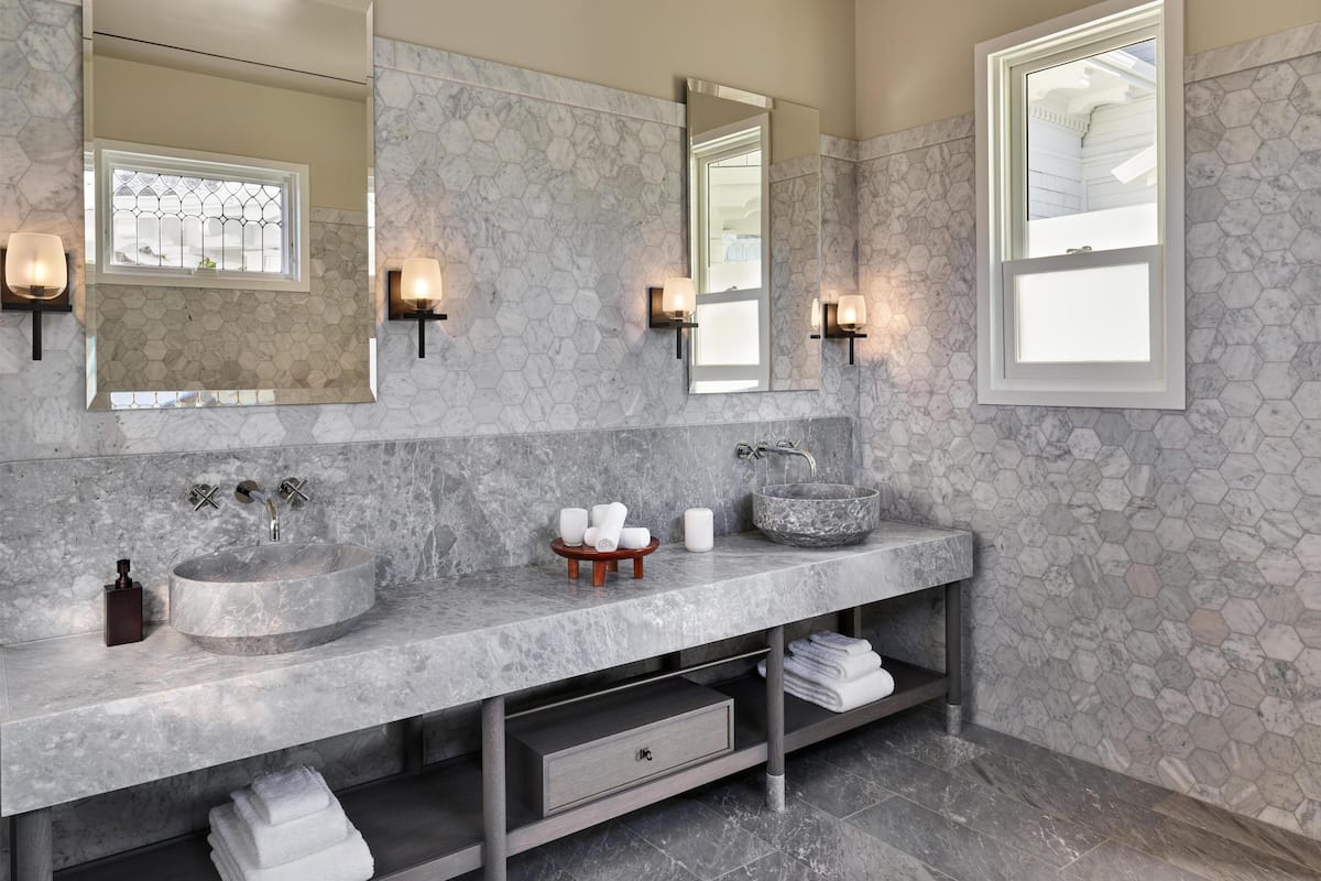 Suite, 1 King Bed (Bridgeview) | Bathroom | Shower, rainfall showerhead, designer toiletries, bathrobes