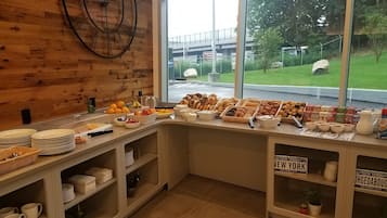 Daily buffet breakfast (USD 12 per person)