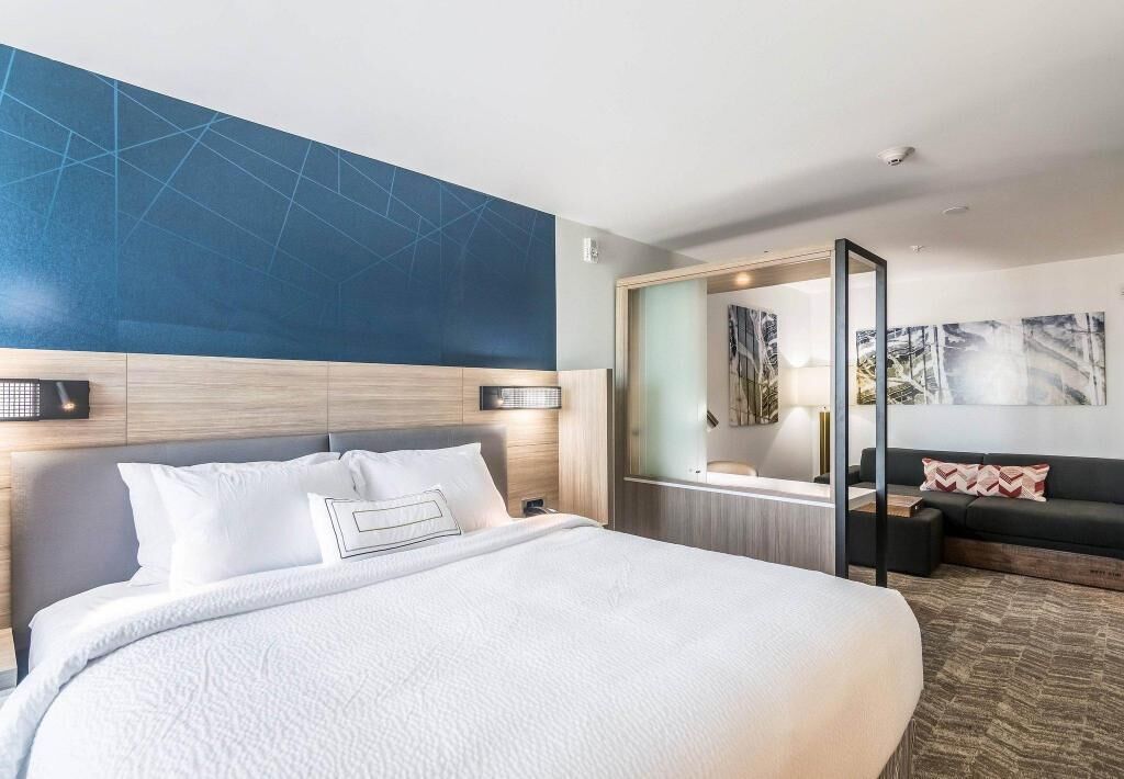 Desk, blackout drapes, iron/ironing board, free cribs/infant beds