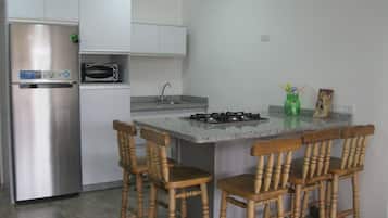 Family Apartment, 2 Bedrooms, Pool View, Tower | Private kitchen | Full-sized fridge, microwave, oven, coffee/tea maker