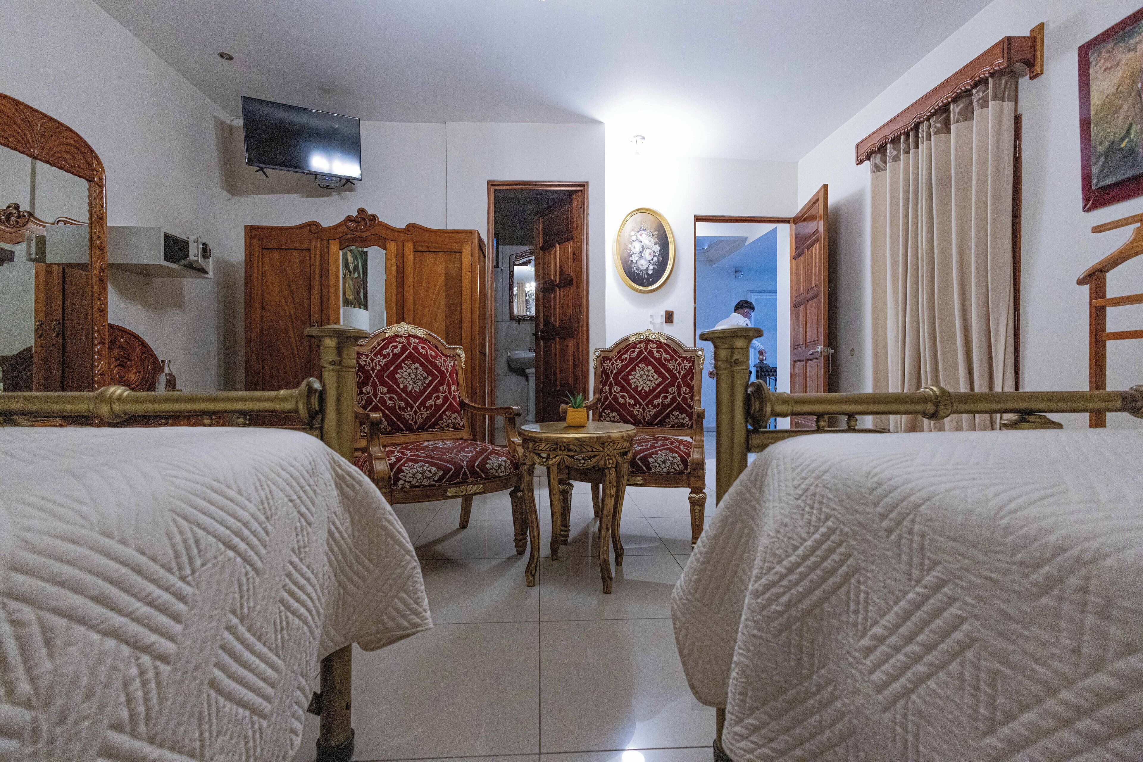 deluxe twin room, 2 queen beds | premium bedding, minibar, in-room safe, iron/ironing board