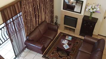 32-inch flat-screen TV with satellite channels, TV