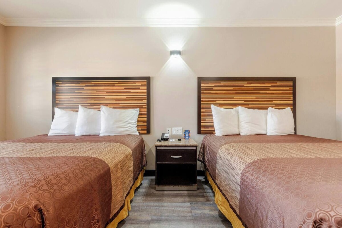 Premium bedding, memory-foam beds, desk, iron/ironing board