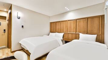 Deluxe Twin (B) | Premium bedding, down comforters, Select Comfort beds, soundproofing