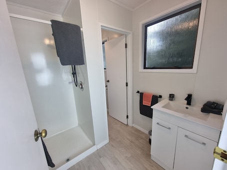 Triple Studio (Unit 6) | Bathroom | Shower, free toiletries, hair dryer, towels. Hacienda Motel