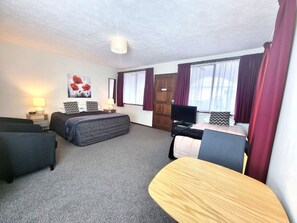 Double Studio (Unit 7) | Living area | Flat-screen TV, DVD player