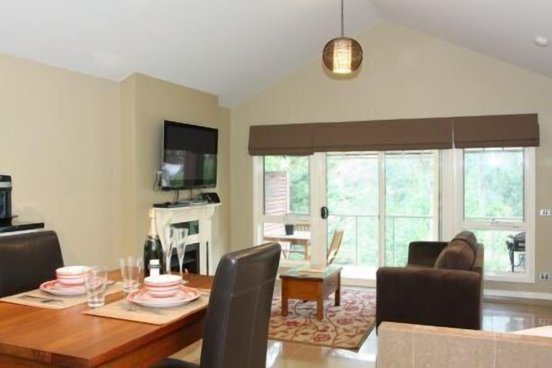 Self Contained Unit | Living area | Flat-screen TV, fireplace, DVD player