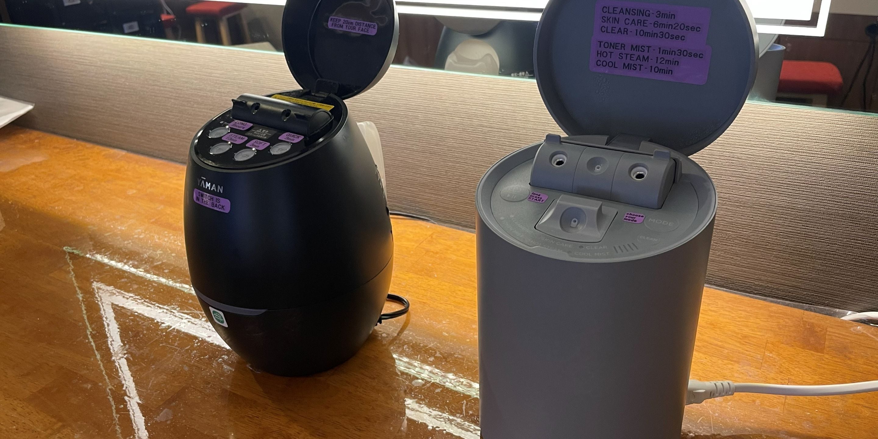 A black portable device with a switch labeled 'YAMAN' and a label indicating 'SWITCH IS BACK' on the top.