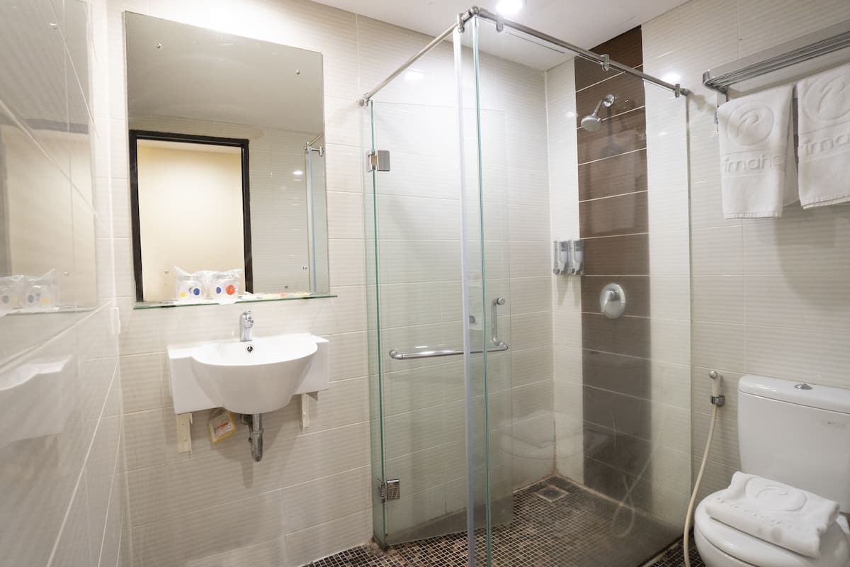 superior room | bathroom | shower, free toiletries, slippers, towels