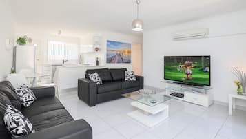 Nuvo - 2 Bedroom with Courtyards | Living room | Flat-screen TV, DVD player