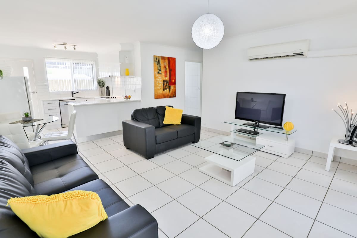 Vogue - 2 Bedroom with Courtyards | Living room | Flat-screen TV, DVD player
