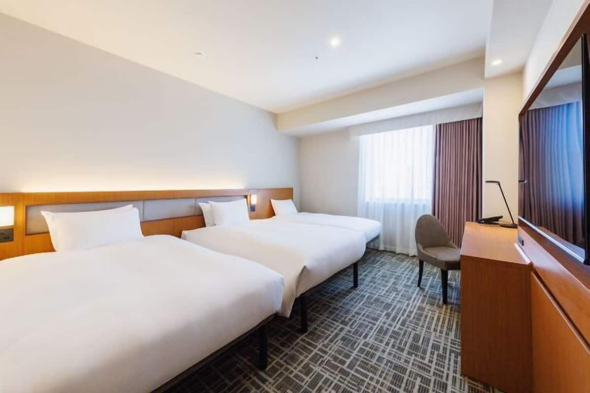 Desk, blackout curtains, free WiFi, bed sheets