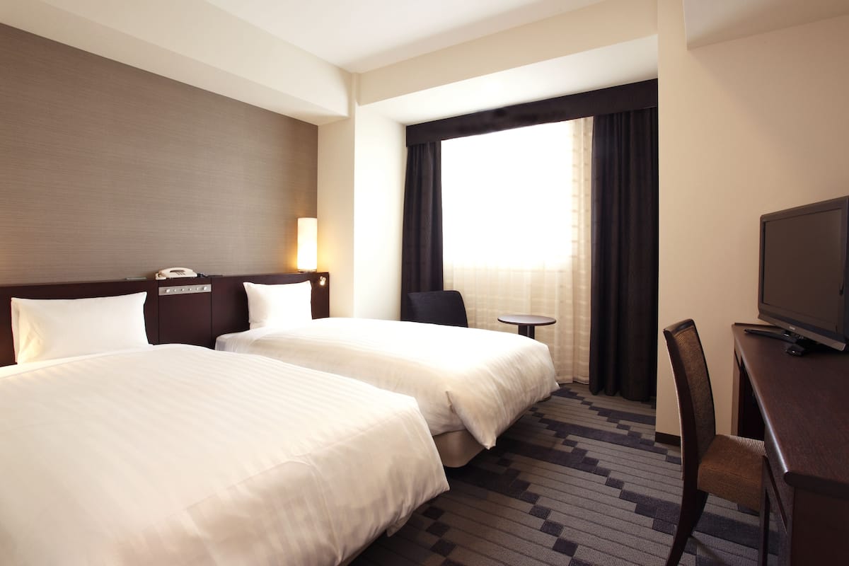 Desk, blackout curtains, free WiFi, bed sheets
