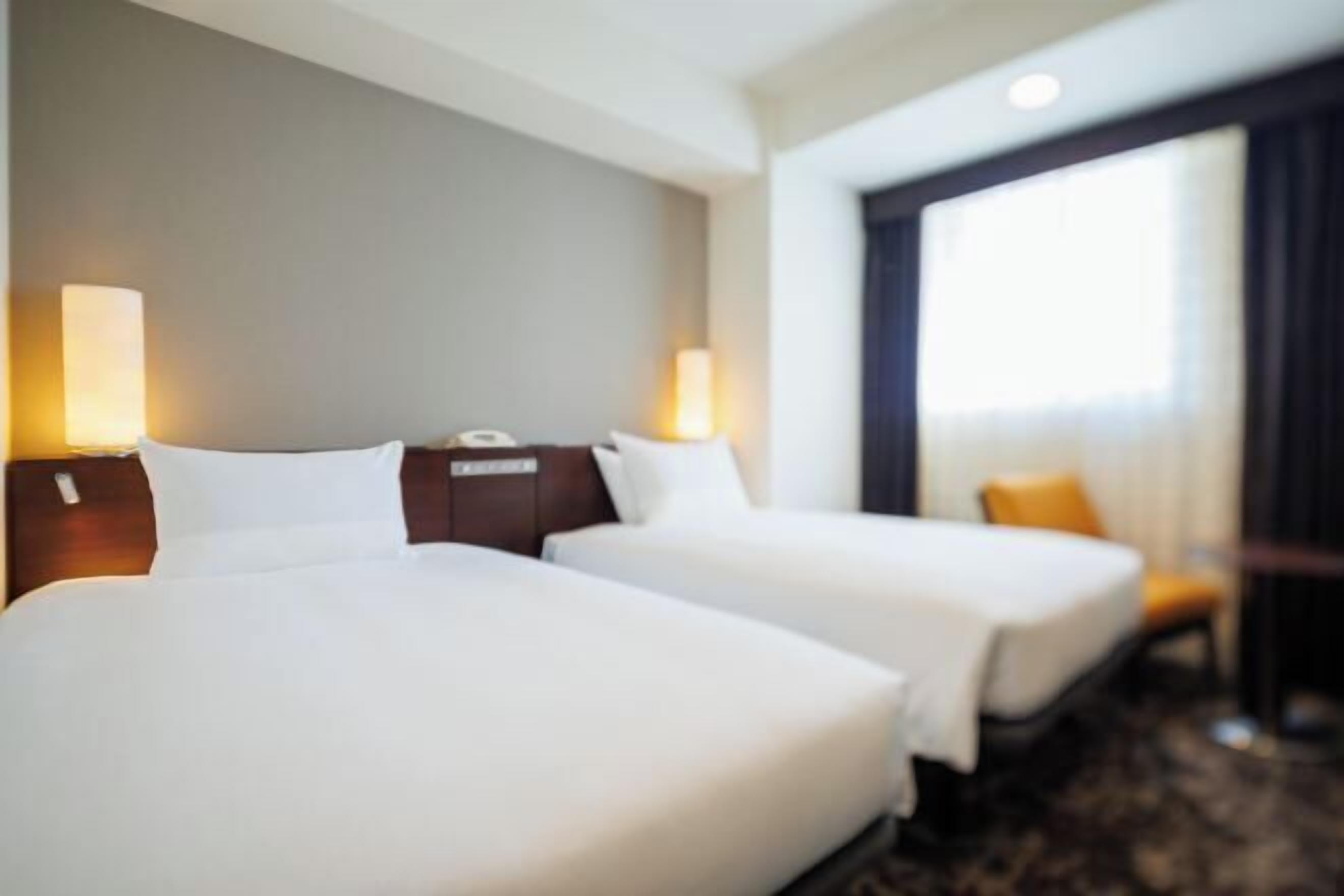 Desk, blackout curtains, free WiFi, bed sheets