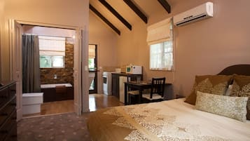 Charmed Cabin | Living area | Flat-screen TV, DVD player