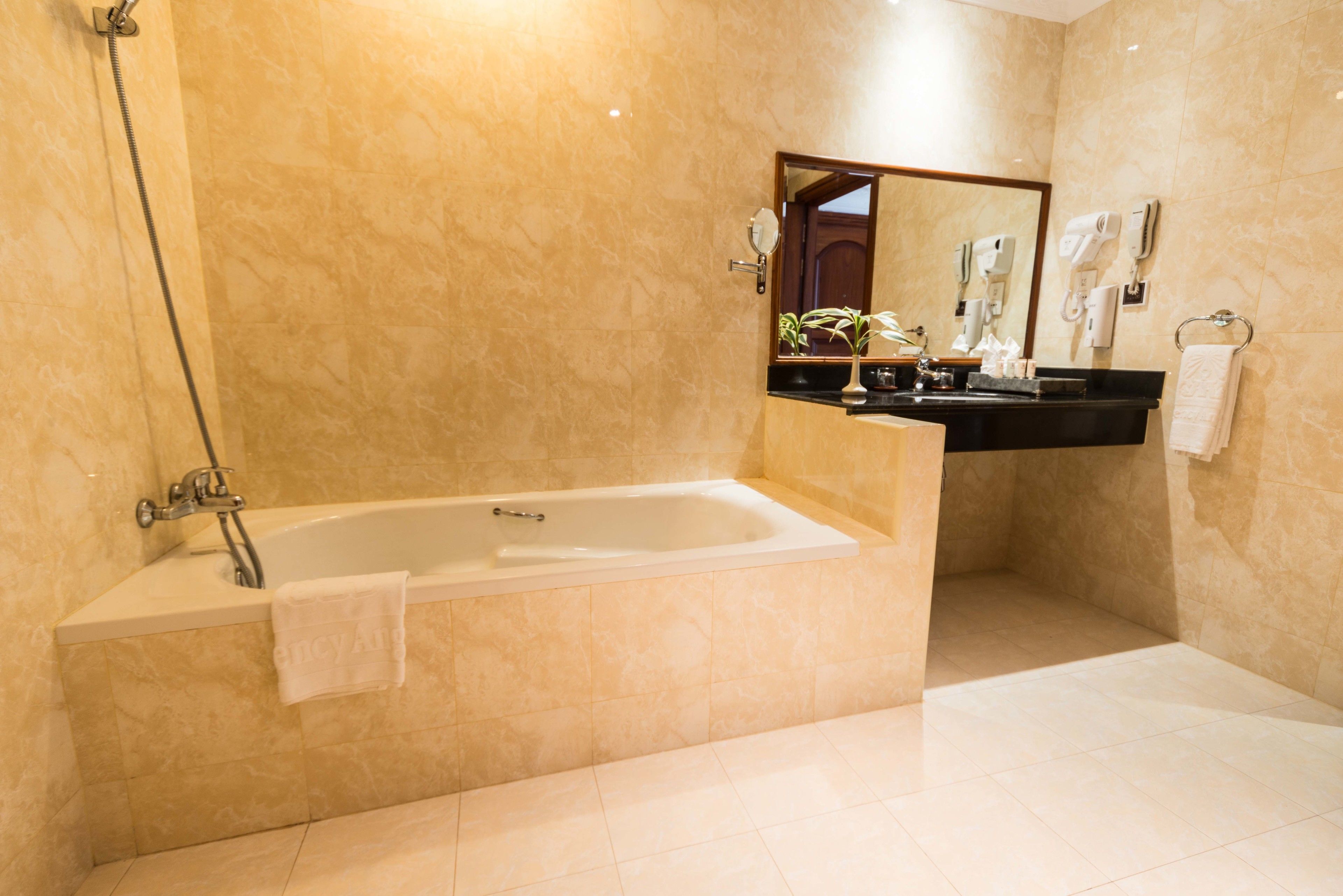 separate bathtub and shower, free toiletries, hair dryer, dressing gowns