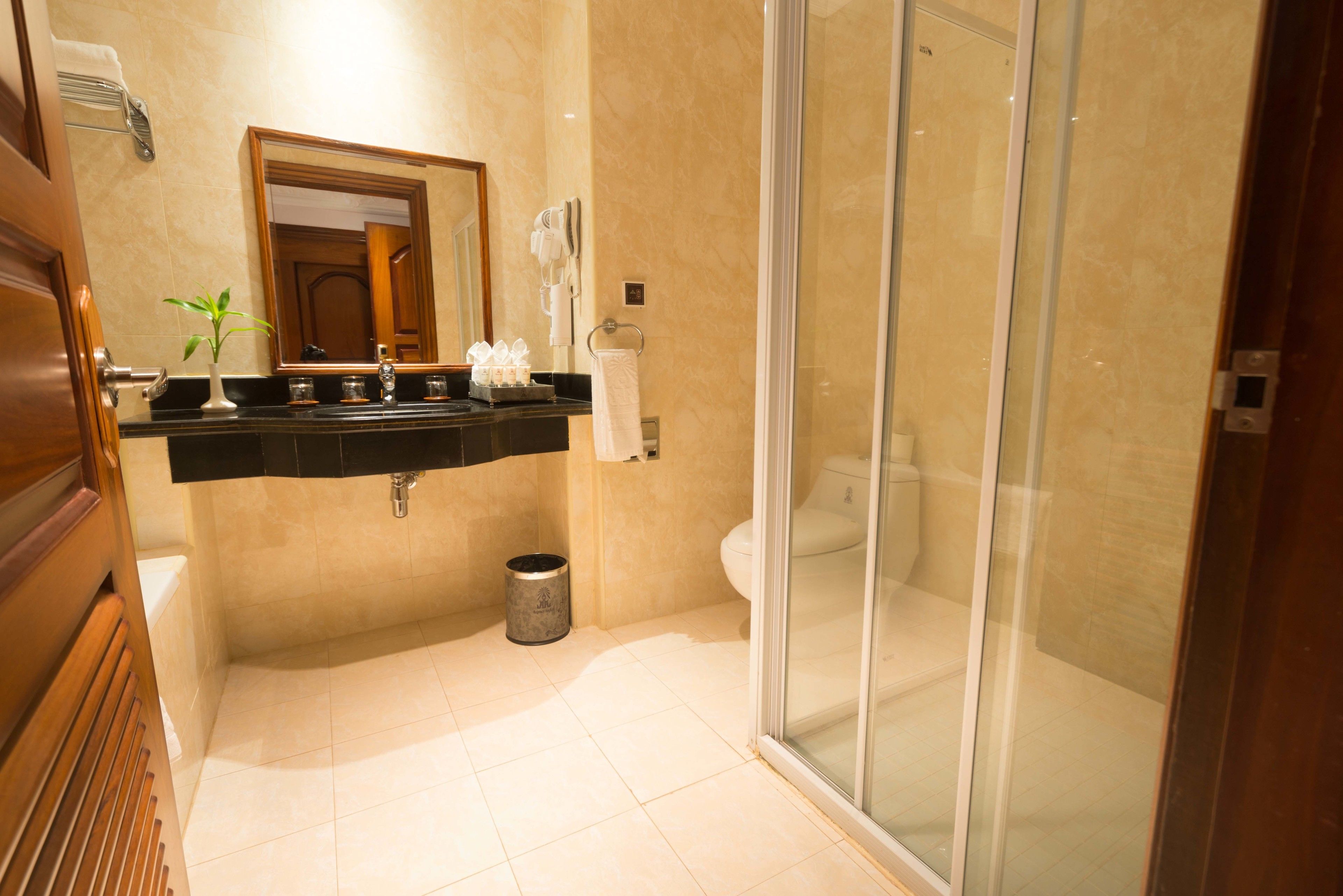 deluxe twin classical | bathroom | separate bathtub and shower, free toiletries, hair dryer, dressing gowns