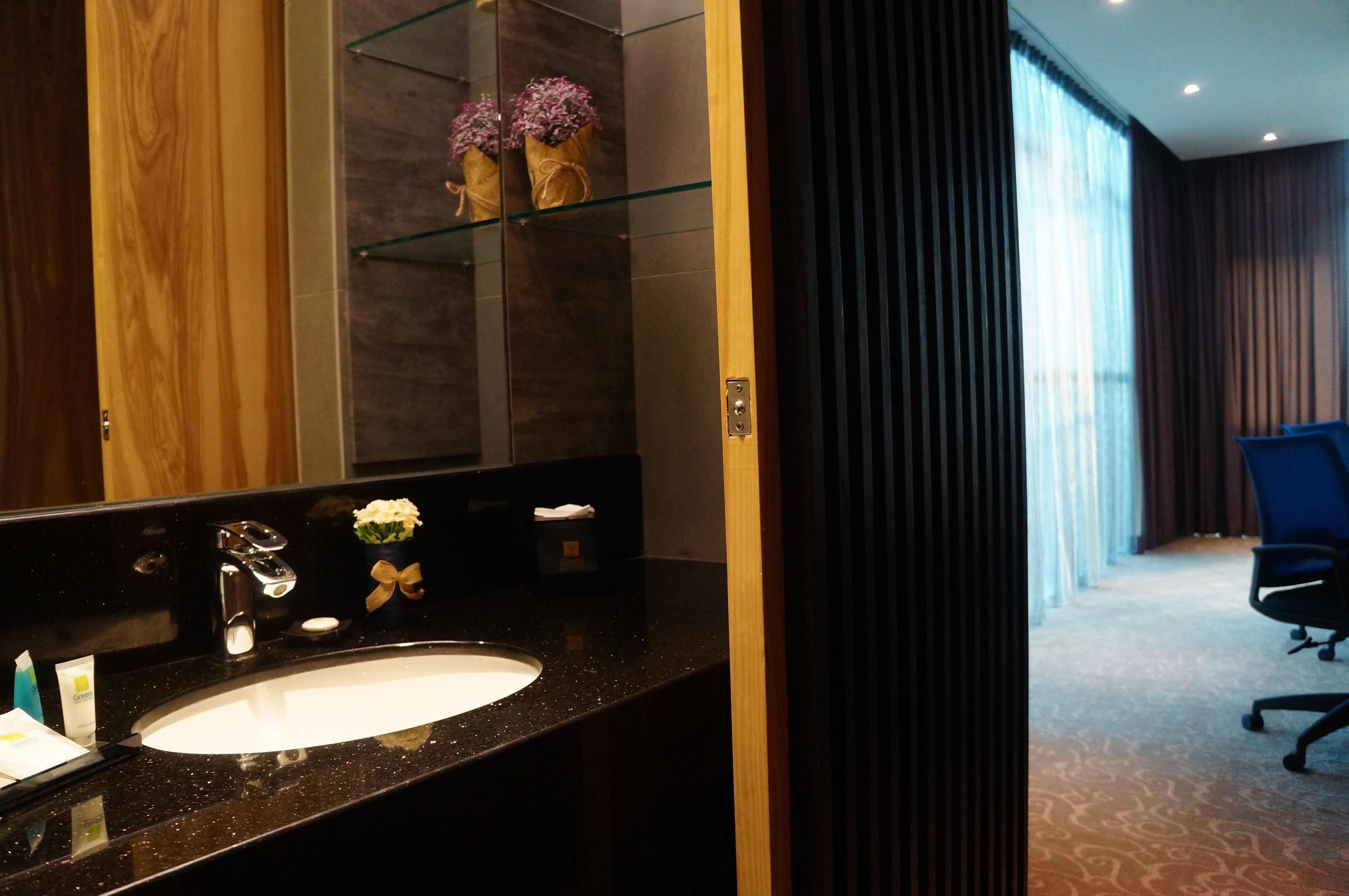 greens suites room | bathroom | shower, free toiletries, hair dryer, slippers