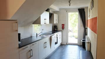 Ferien Haus | Private kitchen | Fridge, stovetop, coffee/tea maker, electric kettle