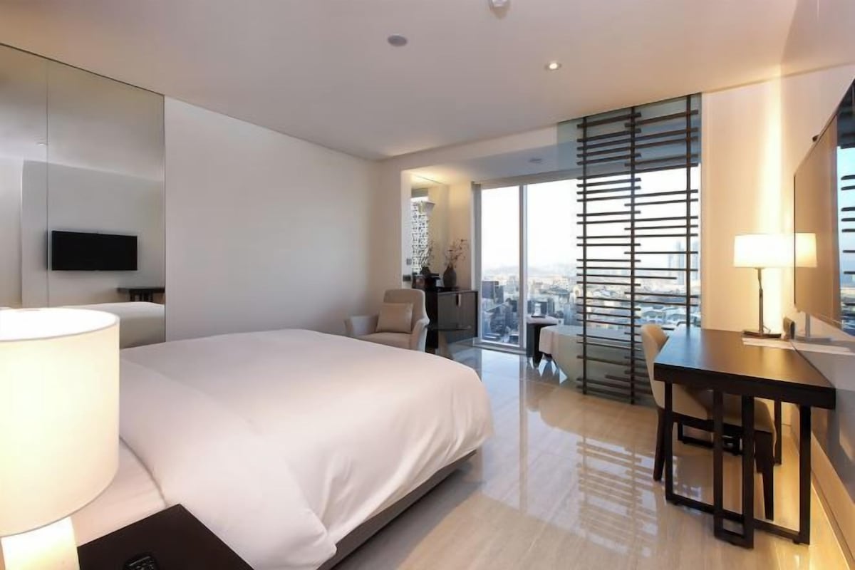 Premium bedding, down duvets, in-room safe, desk