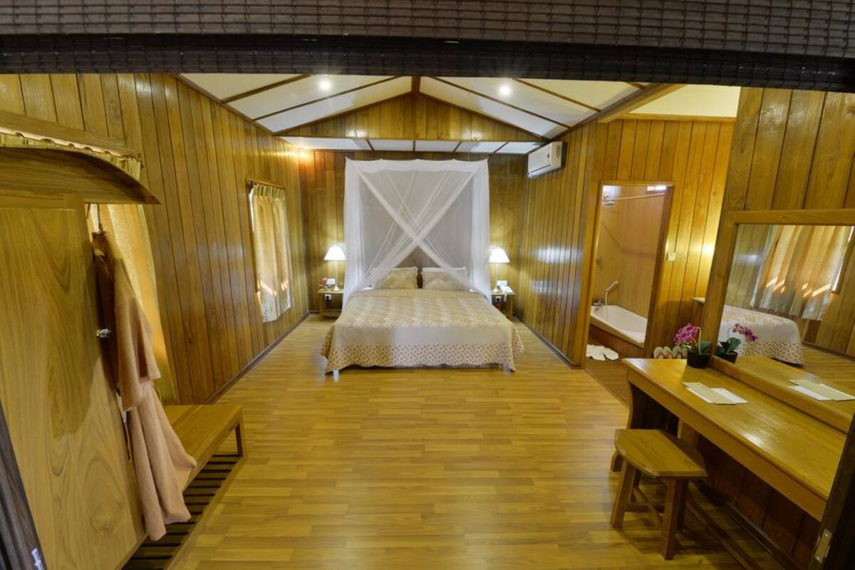 Floating Bungalow | Minibar, in-room safe, individually decorated, desk