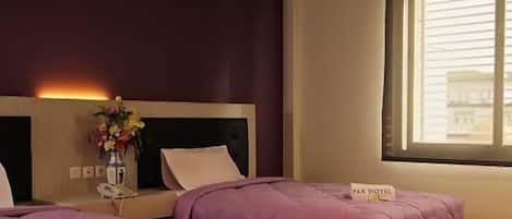 Habitación Deluxe con 2 camas individuales | Escritorio y wifi gratis